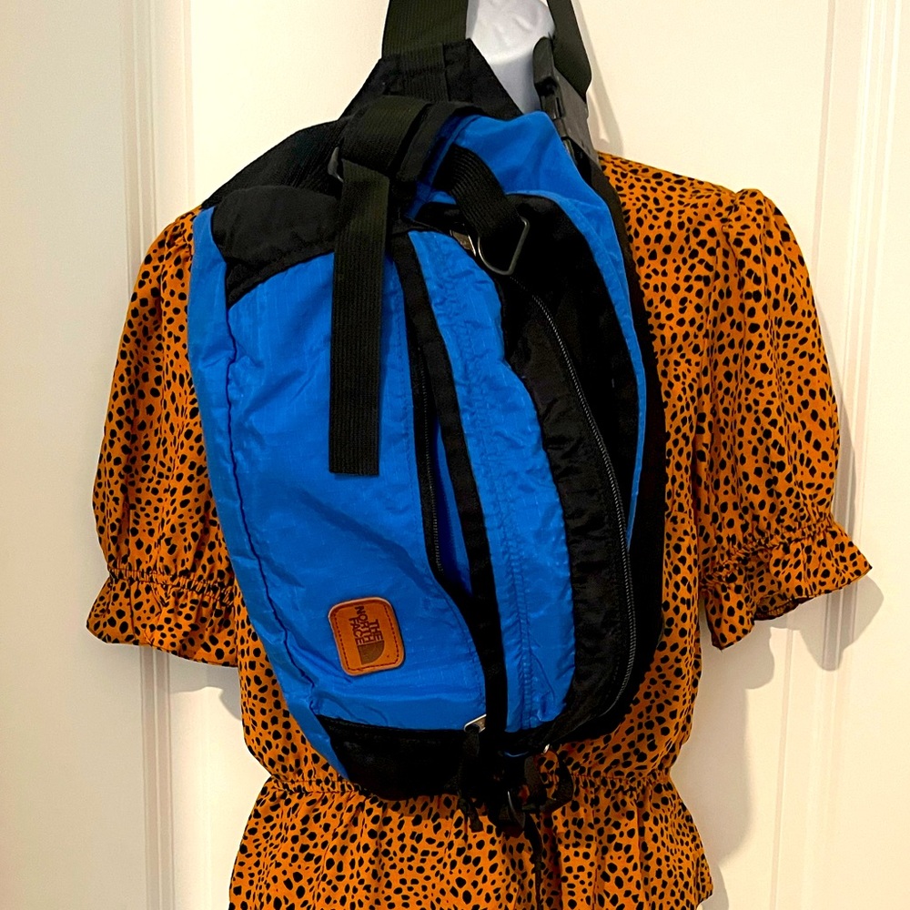 Vintage Blue Northface bag (clothes sold separately).